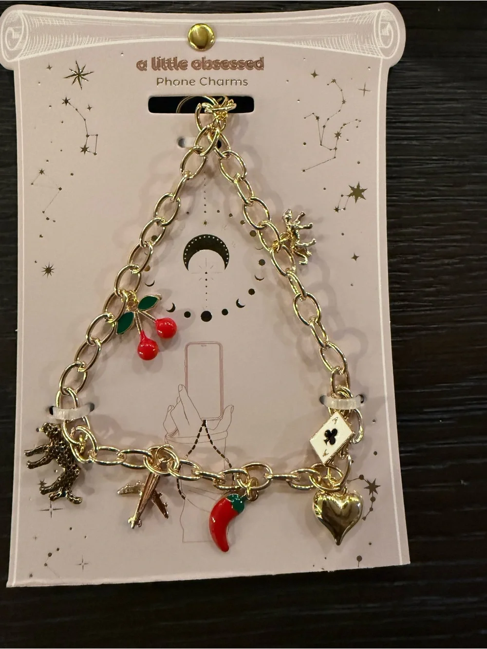 A Little Obsessed Gold Charm Bracelet with Red Enamel Charms